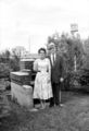 Antique-Shop-Negatives-2 -Middle-Aged-Couple-By-Firepit-In-Yard.jpg