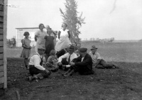 Family-photo-large-group-on-ground.jpg