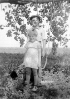 Boy and girl at tree swing.jpg