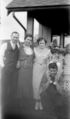 Antique-Shop-Negatives-1 Family-Photo-In-Front-Yard.jpg