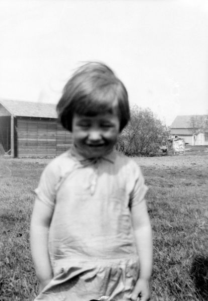 File:Girl-squinting-in-wind.jpg