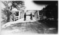 Men-standing-at-bridge-1940s.jpg