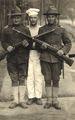 Cook-guarded-by-soldiers-rppc.jpg