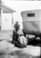 Changing car tire, 1927.jpg