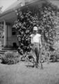 Antique-Shop-Negatives-2 -Person-Wearing-Cap-Holding-Rifle.jpg