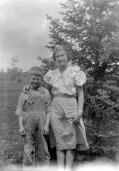 Mom and son by pine tree.jpg