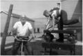 Grandpa-on-bike-kid-on-wagon-on-top-of-table.jpg